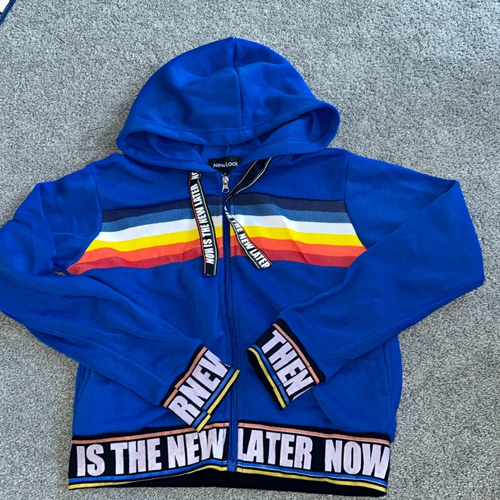 “Now is the new later” zip up hoodie.
